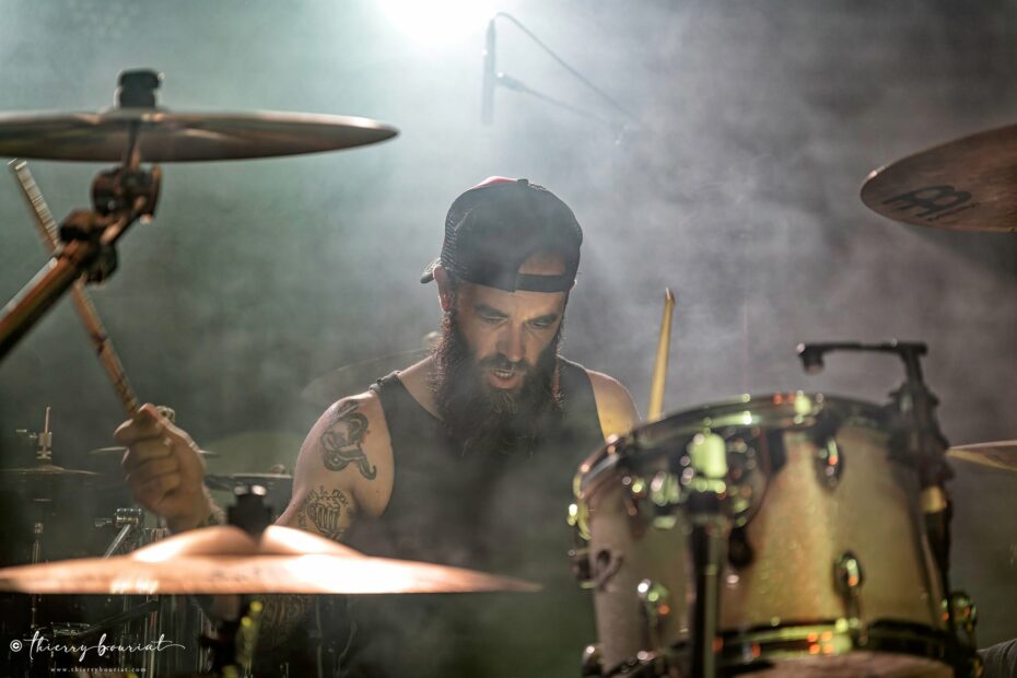 Tom on drums